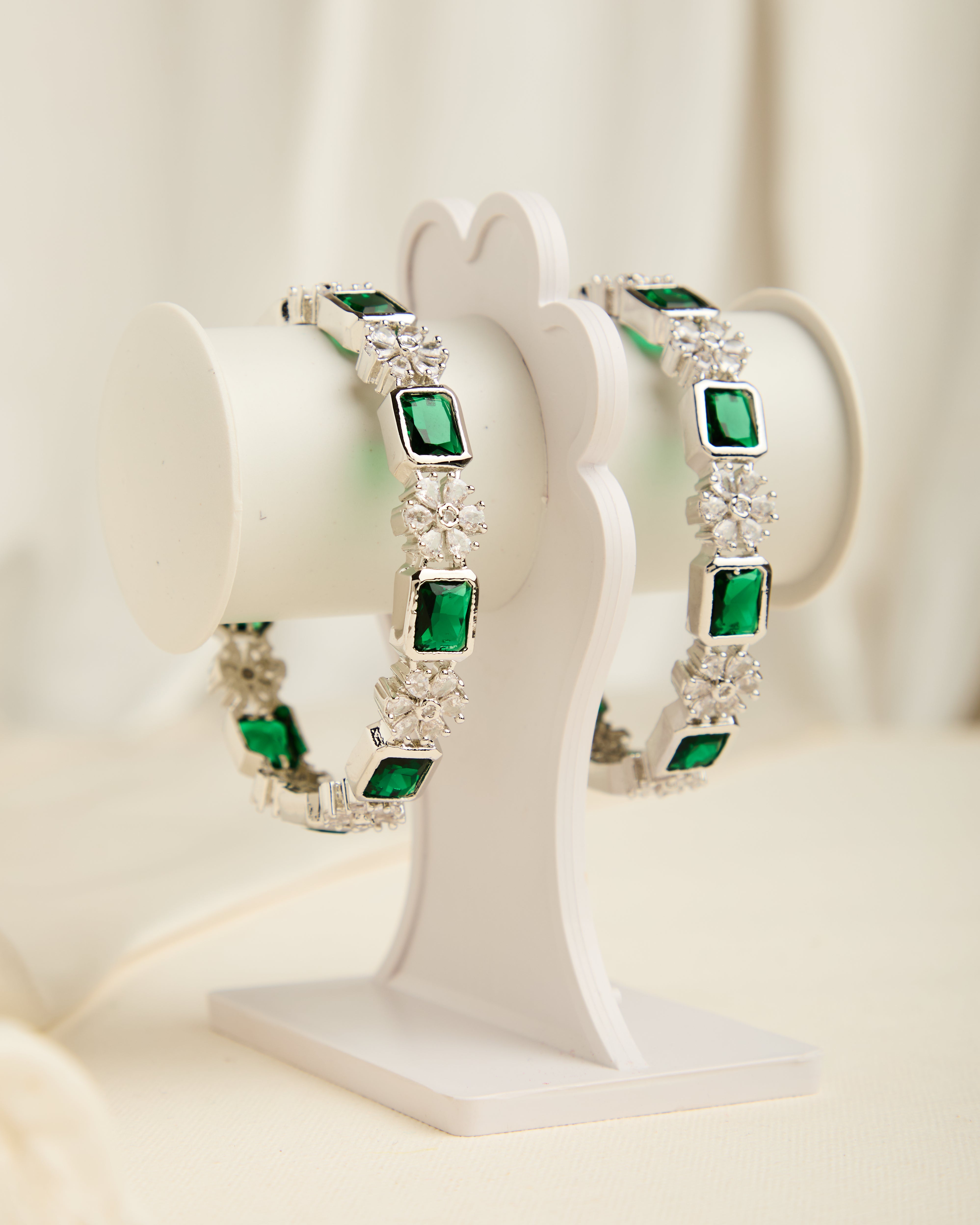 Luxurious Rhodium Plated Green Stone Studded Bangles for Women