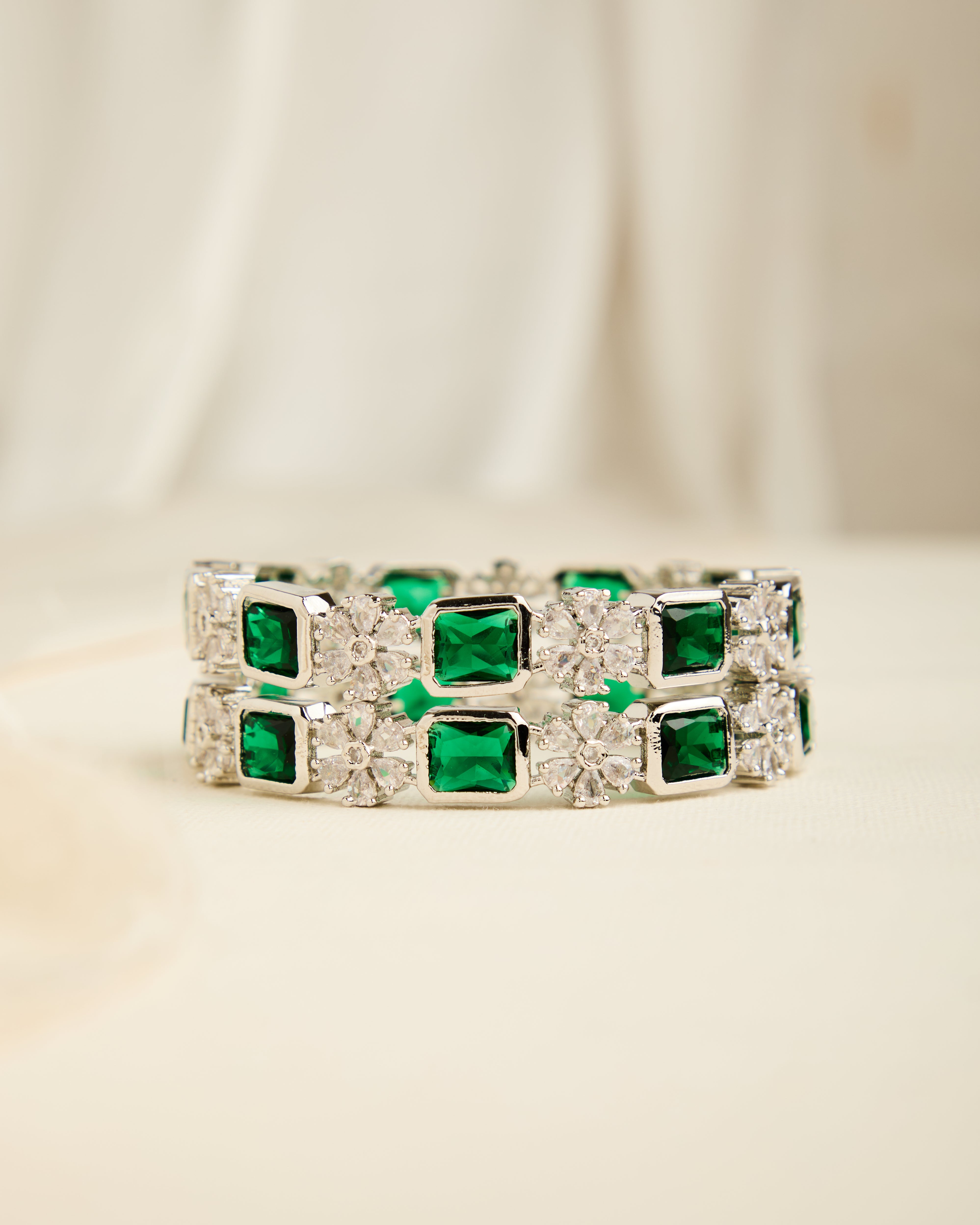 Luxurious Rhodium Plated Green Stone Studded Bangles for Women