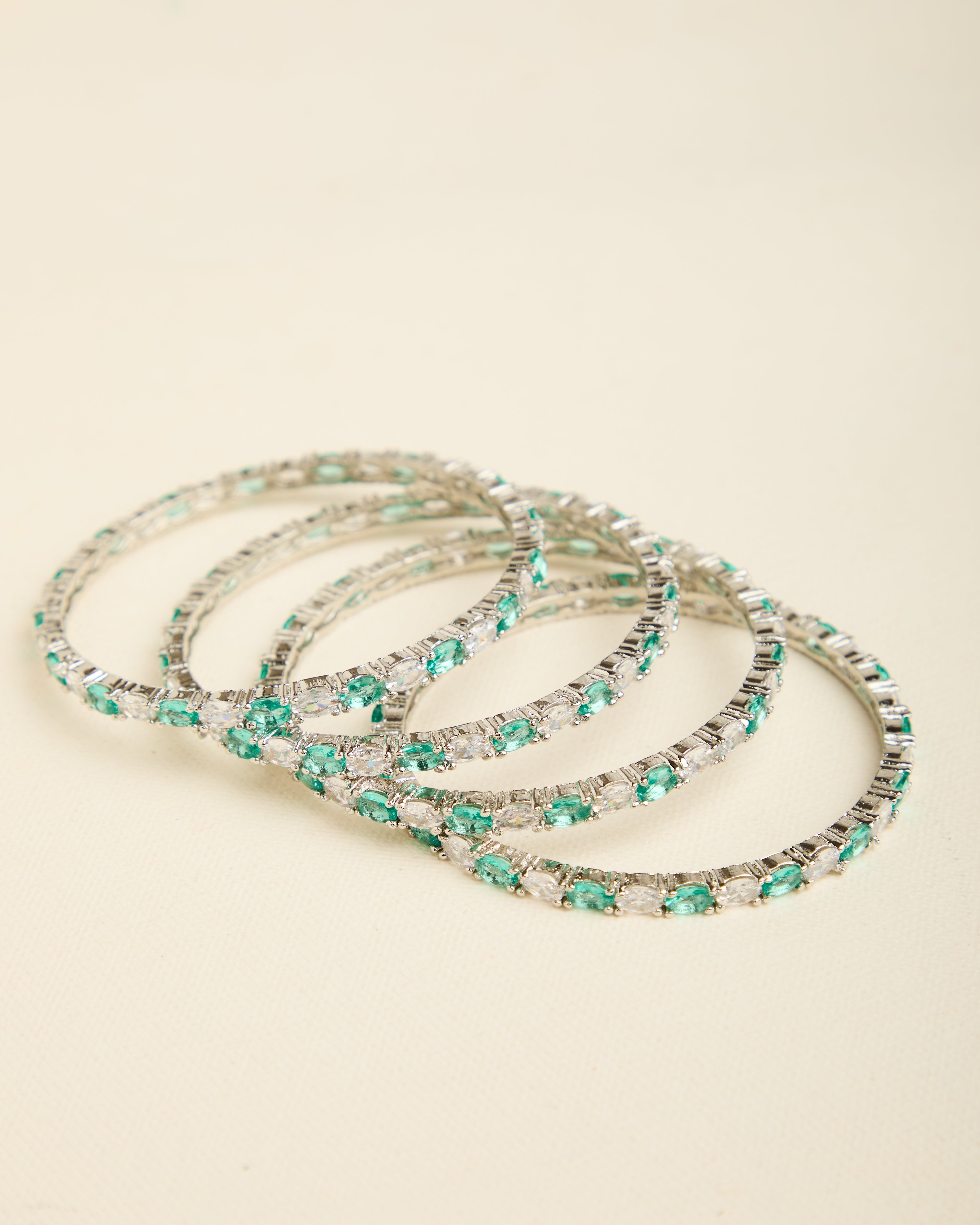 Rhodium Plated American Diamond Designer Set of 4 Bangles with Green Stones for Women