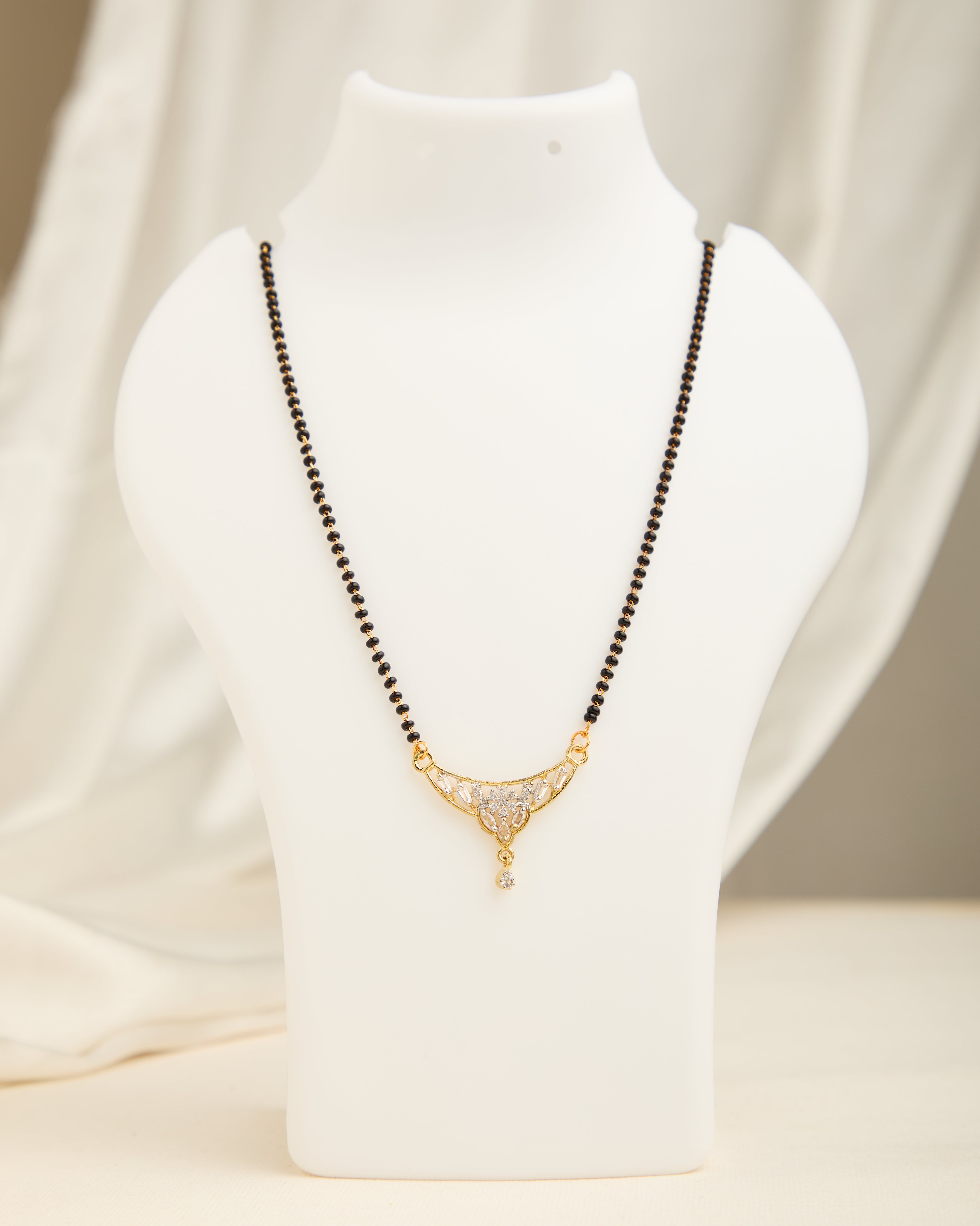 Sparkling Gold Plated Stone Studded Black Beads Mangalsutra