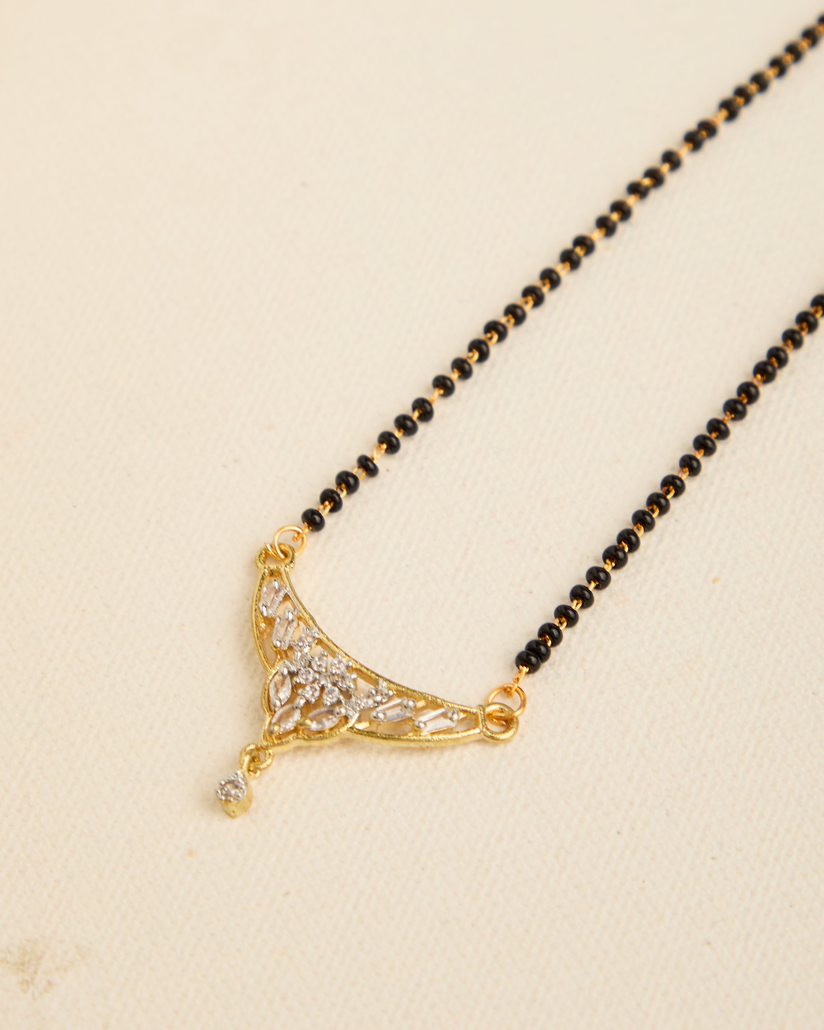 Sparkling Gold Plated Stone Studded Black Beads Mangalsutra