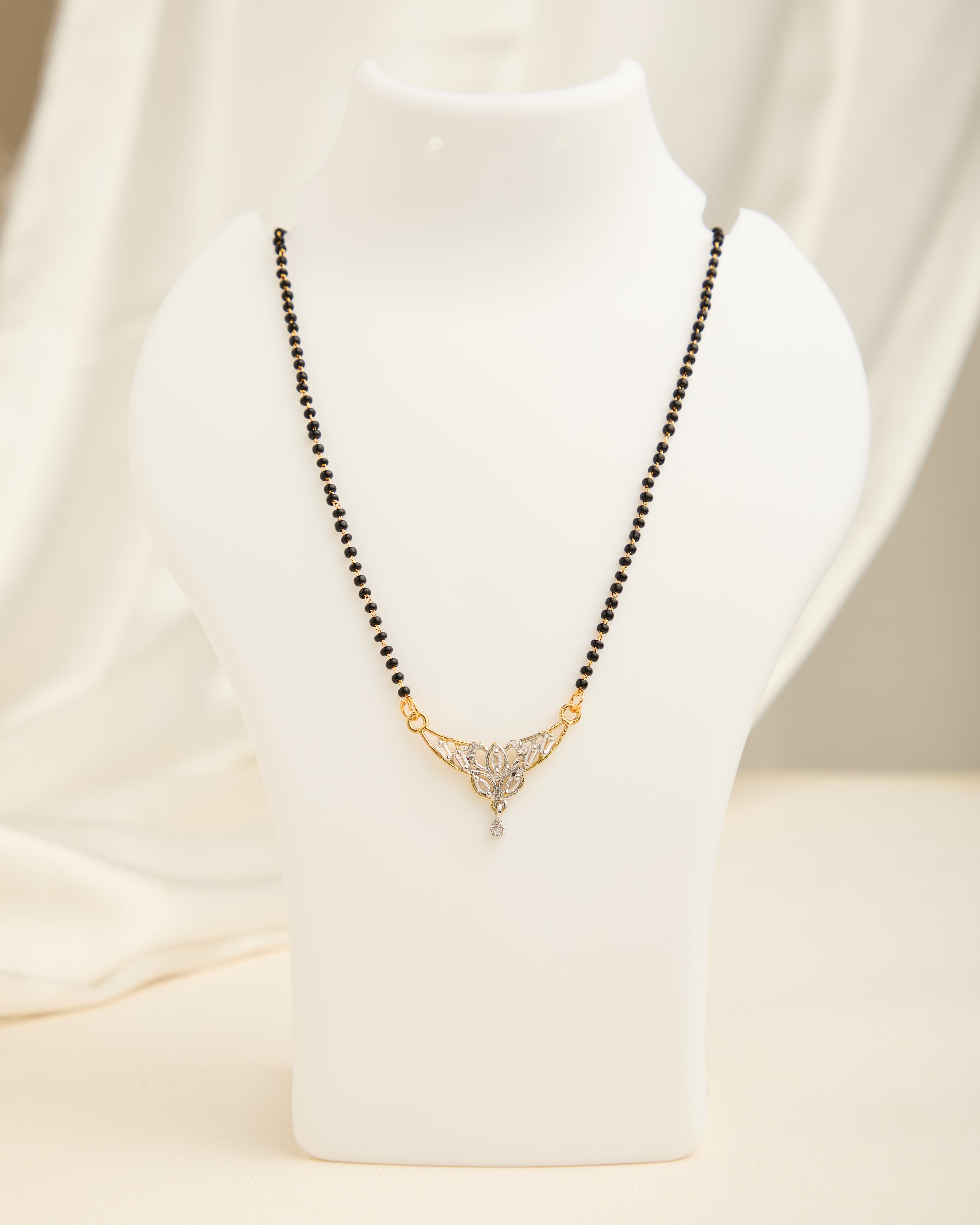 Sparkling Gold Plated Stone Studded Black Beads Mangalsutra