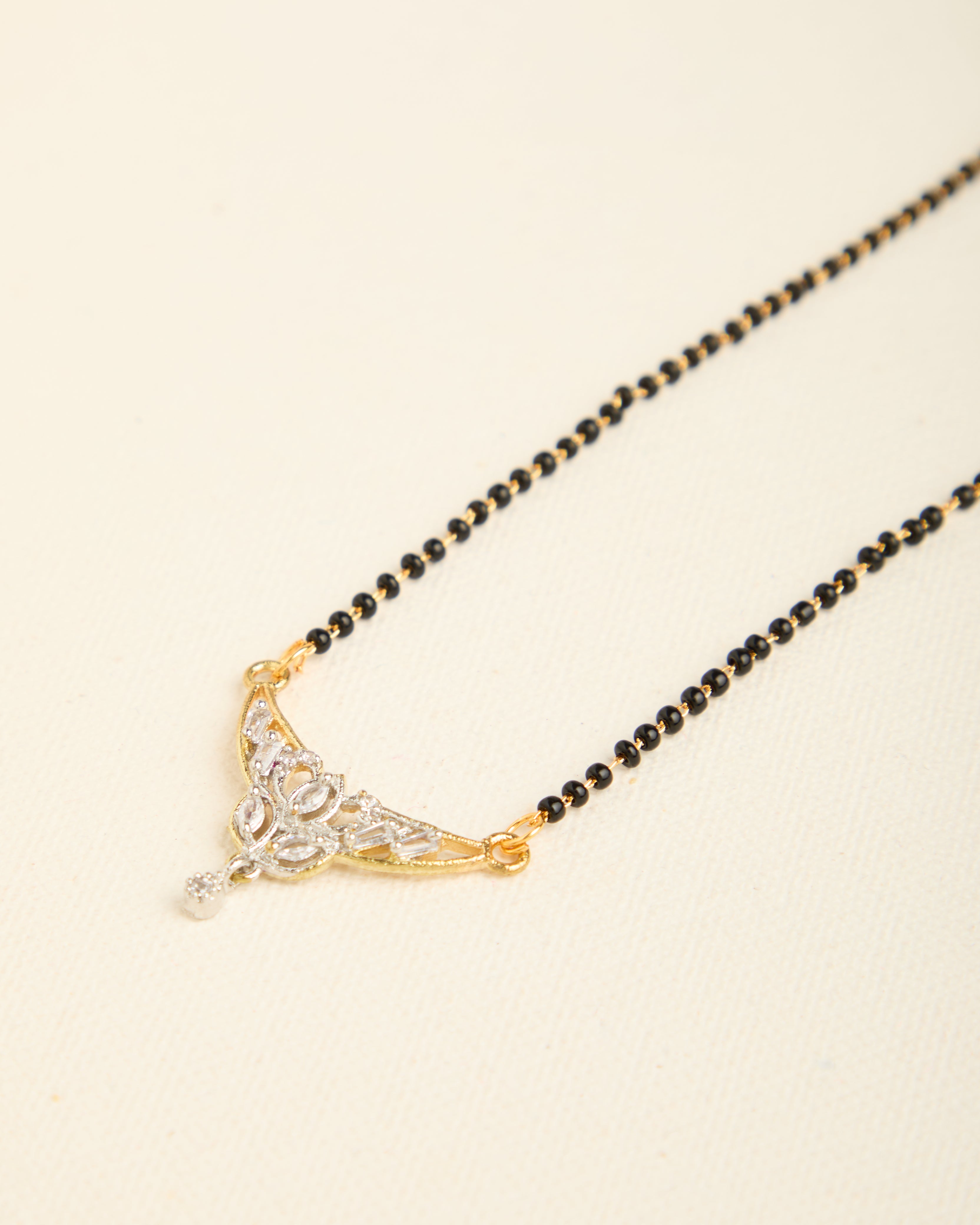 Sparkling Gold Plated Stone Studded Black Beads Mangalsutra